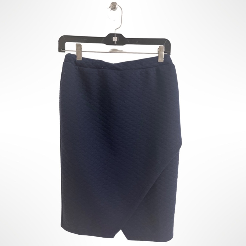 Navy blue quilted pencil with asymmetrical detailing.